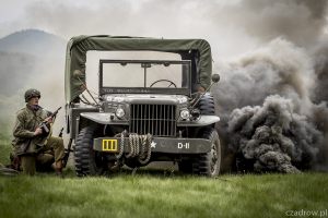 77032